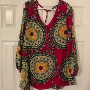 Tunic shirt. Partially open back with pink lace T strip on back